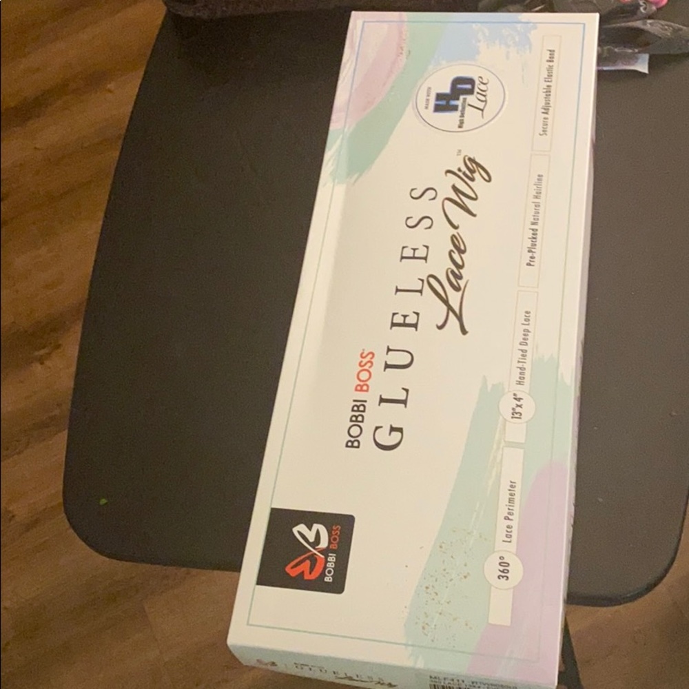 Brand new Bobbi  Boss Glueless lace wig